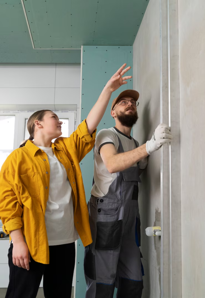 A homeowner instructing a worker