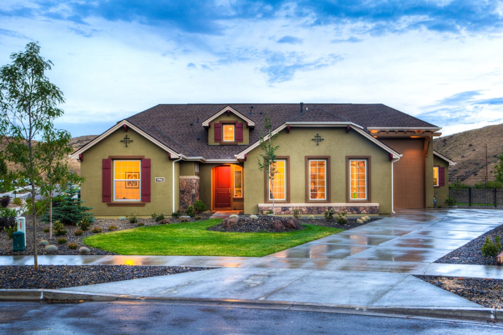 A house with olive green exterior paint