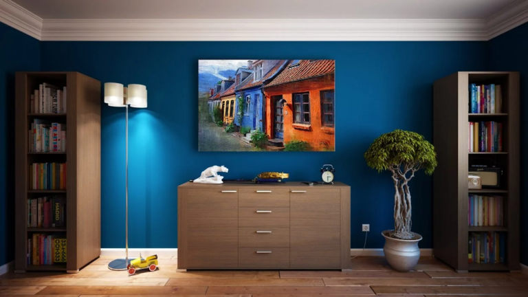 A room with shelves, drawers, and a painting