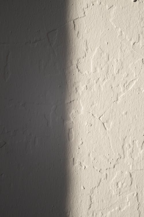 An image of a white wall with a textured surface