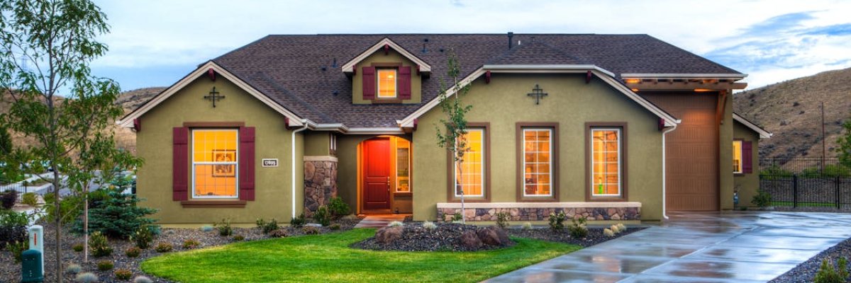 A house with olive green exterior paint