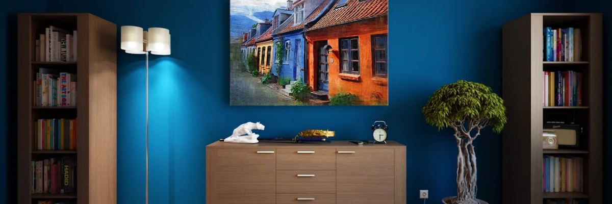 A room with shelves, drawers, and a painting